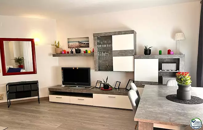 Renovated apartment with large terrace and side view of the canal