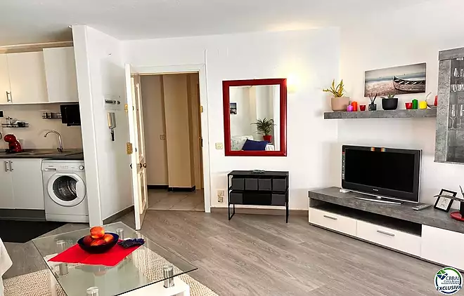 Renovated apartment with large terrace and side view of the canal